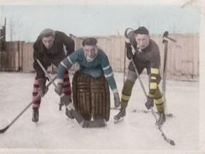 Cam Tait’s dad, Harold, in goal, plays hockey with George Ness, left, and Keith Allen. Tait’s son Darren is seen at right. Photos supplied.