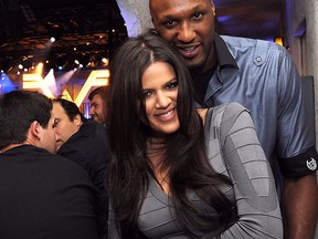 Khloe Kardashian (L) and Los Angeles Laker Lamar Odom are seen in a Sept. 21, 2010 in Hollywood, Calif.  (Michael Buckner/Getty Images For AXE)