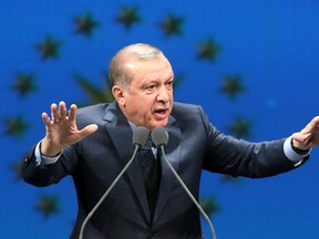 Turkish President Recep Tayyip Erdogan delivers a speech at Bestepe People’s Culture and Congress Center in Ankara on March 29, 2017. (ADEM ALTAN/Getty Images)