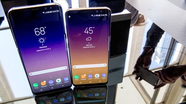 The Samsung Galaxy S8, right, and S8 Plus appear on display after a news conference, Wednesday, March 29, 2017, in New York.  (AP Photo/Mary Altaffer)