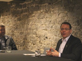 Ontario Green Party leader Mike Schreiner speaks while Warwick Township Mayor Todd Case looks on at a community roundtable held in Petrolia Wednesday. Schreiner spent Tuesday and part of Wednesday in Lambton County, meeting with local stakeholders to discuss community issues. (Barbara Simpson/Sarnia Observer)