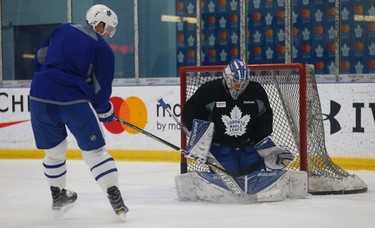 Toronto Maple Leafs Frederik Andersen stops a shot by  Alexey Marchenko (3) as they worked out as part of the optional skate in preparation for their final three-game road trip of the season which starts Thursday against the Nashville Predators on Wednesday March 29, 2017. Jack Boland/Toronto Sun/Postmedia Network
