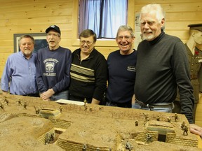 The Plympton-Wyoming Museum is now home to two Vimy Ridge dioramas donated by the Royal Canadian Regiment Museum in London. Pictured here with one of the dioramas are Plympton-Wyoming Museum volunteers Don Poland, Steve Kelch, John Andrew, Gordon MacKenzie and William Munro. (Barbara Simpson/Sarnia Observer/Postmedia Network)