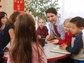 Prime Minister Justin Trudeau meets with children at a YMCA-YWCA day care centre in Winnipeg, Wednesday, March 29, 2017. Trudeau was in Winnipeg to highlight their plan to spend $7 billion over 10 years to create more child care spaces across Canada.