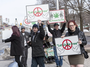 A small group of protestors gathered outside of the Ottawa Courthouse to show support for "budtenders" that were facing charges after police raids earlier this month. March 29,2017. (Errol McGihon/Postmedia)