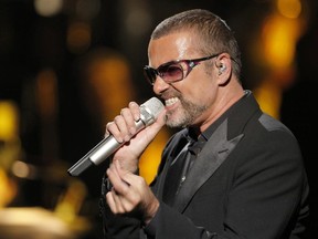 In this Sept. 9, 2012 file photo, British singer George Michael sings in concert to raise money for AIDS charity Sidaction, in Paris, France. A private funeral took place Wednesday March 29, 2017, at Highgate Cemetery, north London, according to a statement released by Michael’s publicity agency, Connie Filippello Publicity, saying the funeral was attended by family and close friends. (AP Photo/Francois Mori, FILE)