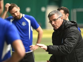 FC Edmonton head coach Colin Miller instructs his players during halftime against the University of Alberta Golden Bears during an exhibition game between the two teams at Foote Field in Edmonton, Tuesday, March 7, 2017. FC Edmonton recently returned from a preseason tour of England.