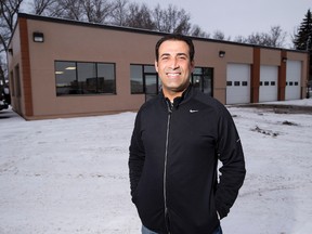 EDMONTON, AB.-- Fawzy Abuamra bought a neighbourhood eyesore a year ago and is working to get it fixed up in order to run a garage and used car lease-to-own lot. It's one of 40 properties the city has been focusing on in a new pilot project to crack down on these nuisance lots. Taken on December 16, 2015, in Edmonton.   (Greg Southam-Edmonton Journal)