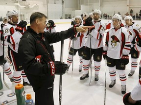 Binghamton Senators head coach Kurt Kleinendorst (centre) had high words of praise for Senators prospect Colin White. (Luke Hendry/Postmedia Network)