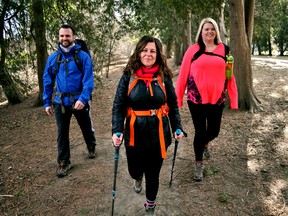 Local realtors Jeff Nethercott (left), Kelley McIntyre, and Lindsay Reid at Springbank Park in London Ont. March 23, 2017. The trio will participate in a fundraising hike in Iceland this summer that will benefit local women’s shelters. CHRIS MONTANINI\LONDONER\POSTMEDIA NETWORK