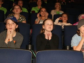 Ecole St-Denis students wait anxiously for the winning city bid to be announced for the 2021 Canada Summer Games at Science North on Thursday. (John Lappa/Sudbury Star)