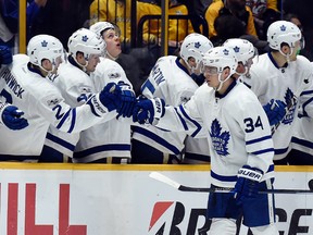 Maple Leafs centre Auston Matthews (34) is congratulated after scoring a goal against the Predators during the second period in Nashville on Thursday, March 30, 2017. (Mark Zaleski/AP Photo)