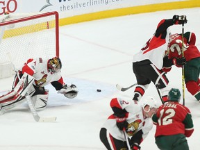 Wild forward Nino Niederreiter (22) shoots the puck into the net past Senators goalie Craig Anderson during first period NHL action in St. Paul, Minn., on Thursday, March 30, 2017. (Stacy Bengs/AP Photo)