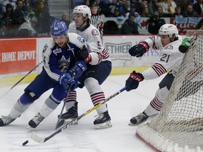 Sudbury Wolves forward CJ Yakimowicz carries the puck behind the Oshawa goal during Game 4 of their OHL opening round playoff series at Sudbury Community Arena on Thursday night. Gino Donato/The Sudbury Star