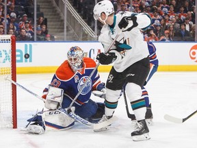 San Jose Sharks forward Jannik Hansen scores on Edmonton Oilers goalie Cam Talbot in Edmonton on Thursday, March 30, 2017. (Jason Franson/The Canadian Press)