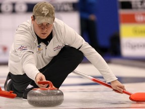 BDO Classic Canadian Open participant John Shuster makes a shot at the MTS Centre on Jan. 21, 2010. (File)