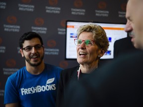 Ontario Premier Kathleen Wynne takes a tour of the Vector Institute at the MaRS Discovery District, in Toronto on Thursday, March 30, 2017. THE CANADIAN PRESS/Christopher Katsarov