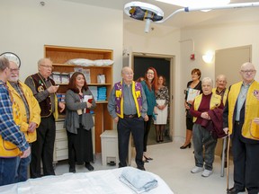 Dr. Graeme Smith, right, gives a tour of one of Kingston General Hospital's labour and recovery rooms to the Kingston Lions Club members after they presented a cheque for $100,000 to University Hospitals Kingston Foundation at Kingston General Hospital in Kingston, Ont. on Wednesday March 29, 2017. The funds will go to purchasing and installing permanent labour tubs in two existing labour and delivery rooms. Julia McKay/The Whig-Standard/Postmedia Network