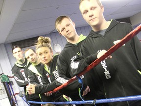 Boxers with the River City club in Sarnia are readying for the first round of provincial amateur Golden Gloves competition in April. Seven are taking part in the event. Pictured are Eric Walker (top left), Ryan Huggett, Mandy Taylor-Bartley, Connor McRae, Kyle McRae, former club member Dylan Taylor (bottom left), Blake Loxton, Jayce Barnaby, Sandy Cucksey and Col Hart. Not pictured is Kyle Murray. Tyler Kula/Sarnia Observer/Postmedia Network