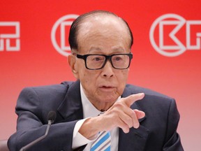 Hong Kong tycoon Li Ka-shing, chairman of CK Hutchison Holdings company, speaks during a press conference to announce the company's annual results in Hong Kong, Wednesday, March 22, 2017. (AP Photo/Kin Cheung)