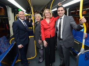 London Mayor Matt Brown, MPP Deb Matthews, MP Kate Young, and MP Peter Fragiskatos, l-r, load up an LTC bus following a press conference at LTC head office to announce new funding for rapid transit on Friday March 31, 2017 (MORRIS LAMONT, The London Free Press)