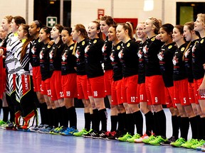 Team Canada players belt out the national anthem prior to their opening game at the 2016 IFF U19 women's world floorball championships at Yardmen Arena. (Intelligencer file photo)