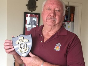 Victor McQueen, the former regimental sergeant major of the Princess of Wales Own Regiment and current president of the association, holds a plaque he made on Wednesday March 29 2017 that he will be taking with him to the 100th Anniversary ceremony for the Battle of Vimy Ridge in France April 4-12.. Ian MacAlpine /The Whig-Standard