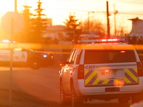 Edmonton Police Service officers investigate a shooting in the area of 52 Street and 128 Avenue in Edmonton on Thursday, March 30, 2017. Ian Kucerak / Postmedia