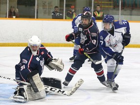 Brady Maltais, right, of the Sudbury Nickel Capital Wolves, watches the puck go past goalie Joshua Eisfeld, of the Mississauga Rebels, as Calder Lund, of the Rebels, looks on during action at the Central Region Midget AAA Championship at the Gerry McCrory Countryside Sports Complex in Sudbury, Ont. on Friday, March 31, 2017. John Lappa/Sudbury Star/Postmedia Network
