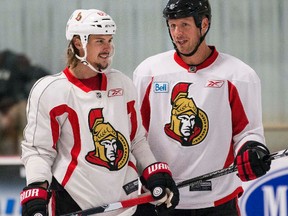 The Senators will be without defencemen Erik Karlsson (left) and Marc Methot for their game in Winnipeg against the Jets on Saturday. (Errol McGihon/Postmedia Network/Files)