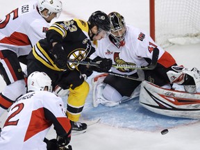 Senators goalie Craig Anderson makes the save on a shot by Bruins left wing Brad Marchand (63) during NHL action in Boston on March 21, 2017. (Charles Krupa/AP Photo)