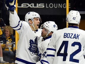 Maple Leafs left wing James van Riemsdyk (left) celebrates with centre Nazem Kadri (43) after scoring a goal against the Predators during the first period in Nashville on Thursday, March 30, 2017. (Mark Zaleski/AP Photo)