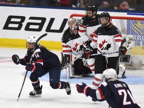 Brianna Decker (14) of the U.S. celebrates her goal against Canada during the second period of the women's world hockey championship in Plymouth, Mich., on Friday, March 31, 2017. (Jason Kryk/The Canadian Press)
