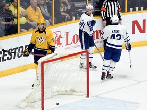 Maple Leafs forward Connor Brown (left) celebrates with teammate Nazem Kadri after scoring a empty-net goal against the Nashville Predators on Thursday. Brown has 19 goals this season. (MARK ZALESKI/AP)