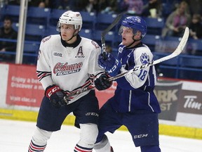 Sean Allen of the Oshawa Generals battles for position with Macauley Carson of the Sudbury Wolves during OHL playoff action in Sudbury, Ont. on Tuesday March 28, 2017. Gino Donato/Sudbury Star/Postmedia Network