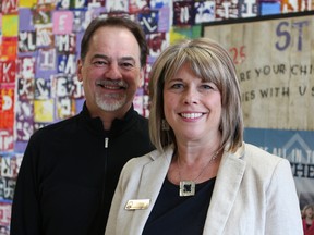 Photo Caption: Principal Boyan Yarovenko and Tammy Leslie, an elementary math consultant for the Edmonton Catholic School District, stand for a photo in the lobby of St. Paul Elementary School at 14410 96 Avenue on Friday, March 24, 2017. St Paul Elementary School was identified as one of 19 schools in Edmonton showing significant improvement in their Grade 6 Mathematics Provincial Achievement Test results in the Fraser Institute's 2017 Report Card on Alberta's Elementary Schools. Claire Theobald/Postmedia