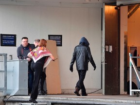 A person supposedly being the artist Bob Dylan wearing a black jacket and a hoodie is photographed while entering the backstage door at Stockholm Waterfront April 1, 2017, where Bob Dylan is preforming the same night. Dylan is in Sweden to perform but also to receive his Nobel diploma and the Nobel medal during his visit to Sweden. JESSICA GOW/AFP/Getty Images