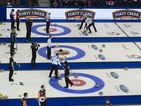 Hardcore curling fans watch the first day of curling at the Mens's World Curling Championships at Northlands Coliseum on April 1, 2017.