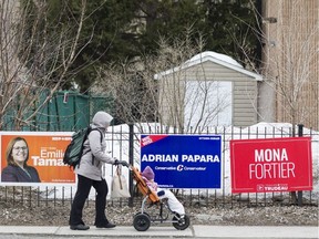 Federal by-election candidate signs posted in the riding of Ottawa–Vanier along Montreal Rd. in Ottawa are pictured in this March 31, 2017 file photo. On April 3, residents will vote for a new member of parliament. (Errol McGihon/Postmedia
