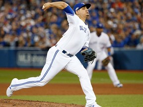 Toronto Blue Jays' Roberto Osuna pitches in the ninth inning of game three of the American League Championship Series in Toronto on Monday Oct. 17, 2016. (Michael Peake/Postmedia Network)