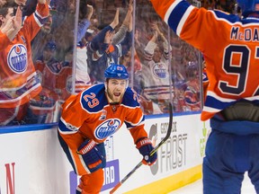 Edmonton Oilers forwards Leon Draisaitl (29) and Connor McDavid celebrate the overtime winner against the Anaheim Ducks at Rogers Place in Edmonton on April 1, 2017. (Amber Bracken)