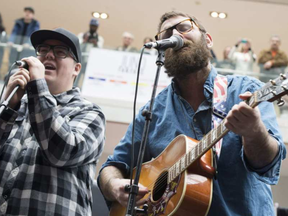 Simon Ward, right, and David Ritter of The Strumbellas perform at the Juno FanFest at the Rideau Centre in Ottawa on Saturday, April 1, 2017. JUSTIN TANG / THE CANADIAN PRESS