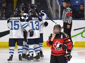 Canada’s Natalie Spooner looks up at the scoreboard after Finland scored during the world championship in Plymouth, Mich., on Saturday, April 1, 2017. (THE CANADIAN PRESS/Jason Kryk)