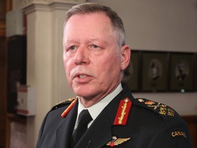 Gen. Jonathan Vance, Chief of the Defense Staff for the Canadian Forces, speaks on the results of a review of the Royal Military College of Canada in Kingston, Ont. on Wednesday March 29, 2017. (Steph Crosier/Kingston Whig-Standard)