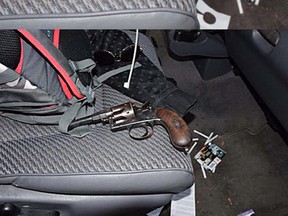 Two handguns were found in a vehicle Kingston police stopped on Friday March 31 2017. In a searched of the vehicle officers also found drug paraphernalia, suspected cocaine, suspected marijuana, ammunition, a large knife, a black bandana, and large zip ties. Kingston Police photo