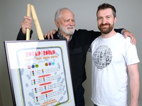 Artist Billy Burt Young, right, and collaborator Jim Millar show their piece of art that will be auctioned at the UP-withArt fundraiser for the Unity Project for Relief of Homelessness on Saturday at The Palace Theatre. (MORRIS LAMONT, The London Free Press)