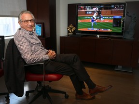 Paul Godfrey, president and CEO, of Postmedia Network Inc. is pictured in his office as the Blue Jays play their first game of the season. (DAVE ABEL, Toronto Sun)