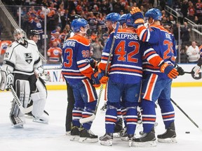 The Edmonton Oilers celebrate a goal in front of Los Angeles Kings goalie Jonathan Quick in Edmonton on March 28, 2017. (The Canadian Press)