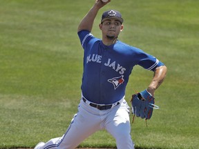 Toronto Blue Jays relief pitcher Roberto Osuna delivers to the New York Yankees during the sixth inning of a spring training baseball game Wednesday, March 29, 2017, in Dunedin, Fla. (CHRIS O'MEARA/AP files)