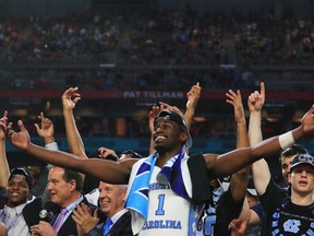 Theo Pinson #1 of the North Carolina Tar Heels celebrates after defeating the Gonzaga Bulldogs during the 2017 NCAA Men's Final Four National Championship game at University of Phoenix Stadium on April 3, 2017 in Glendale, Arizona. The Tar Heels defeated the Bulldogs 71-65. (Photo by Ronald Martinez/Getty Images)